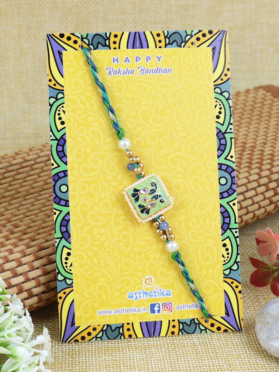

Asthetika Men Peacock Motif With Stone-Studded & Beaded Thread Rakhi, Green