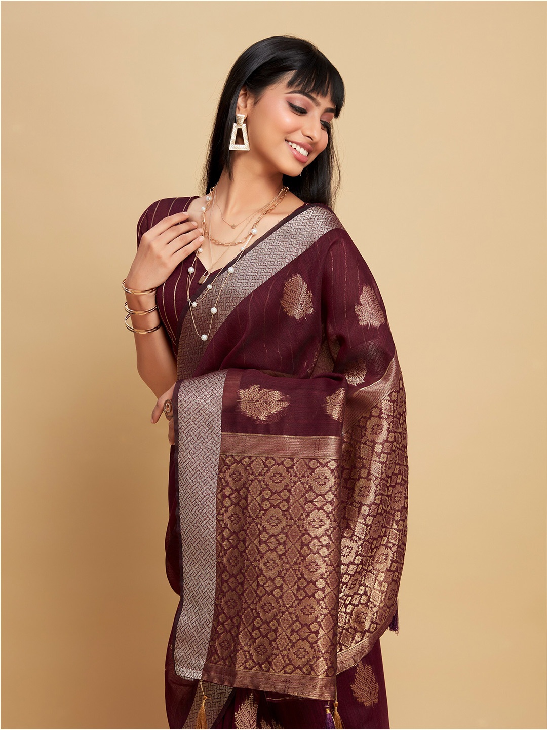 

Sangria Magenta Ethnic Motifs Woven Design Zari Saree