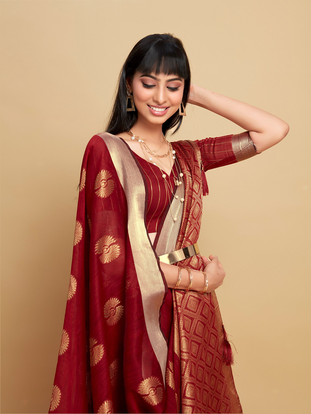 

Sangria Red Ethnic Motifs Woven Design Zari Saree