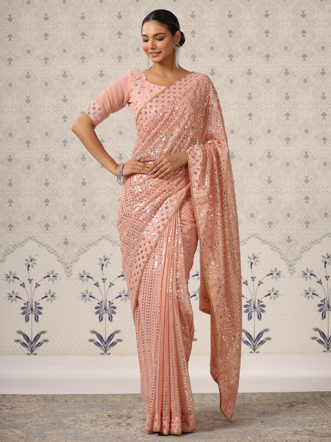 

Ode by House of Pataudi Peach Coloured Embellished Sequinned Saree