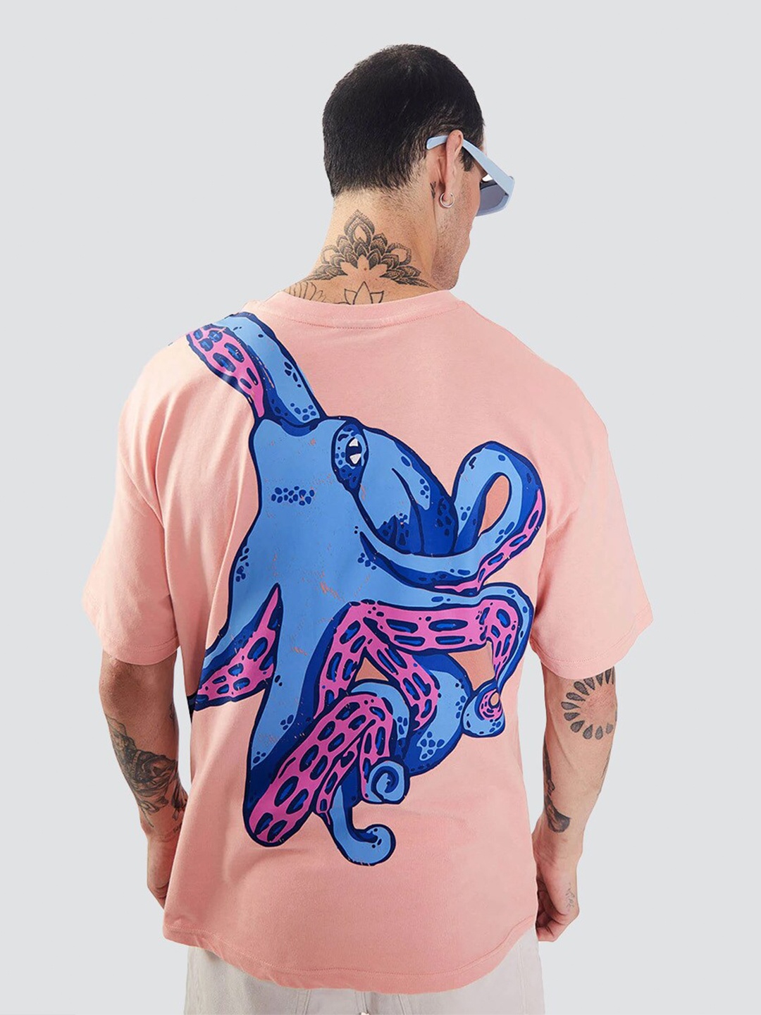

Bonkers Corner Men Peach-Coloured Graphic Printed Over-Sized Cotton Casual T-Shirt