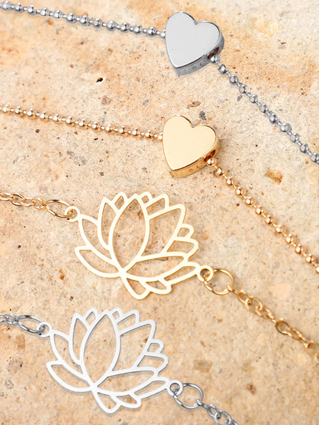 

OOMPH Set Of 4 Silver & Gold Plated Heart & Lotus Shaped Charm Anklets