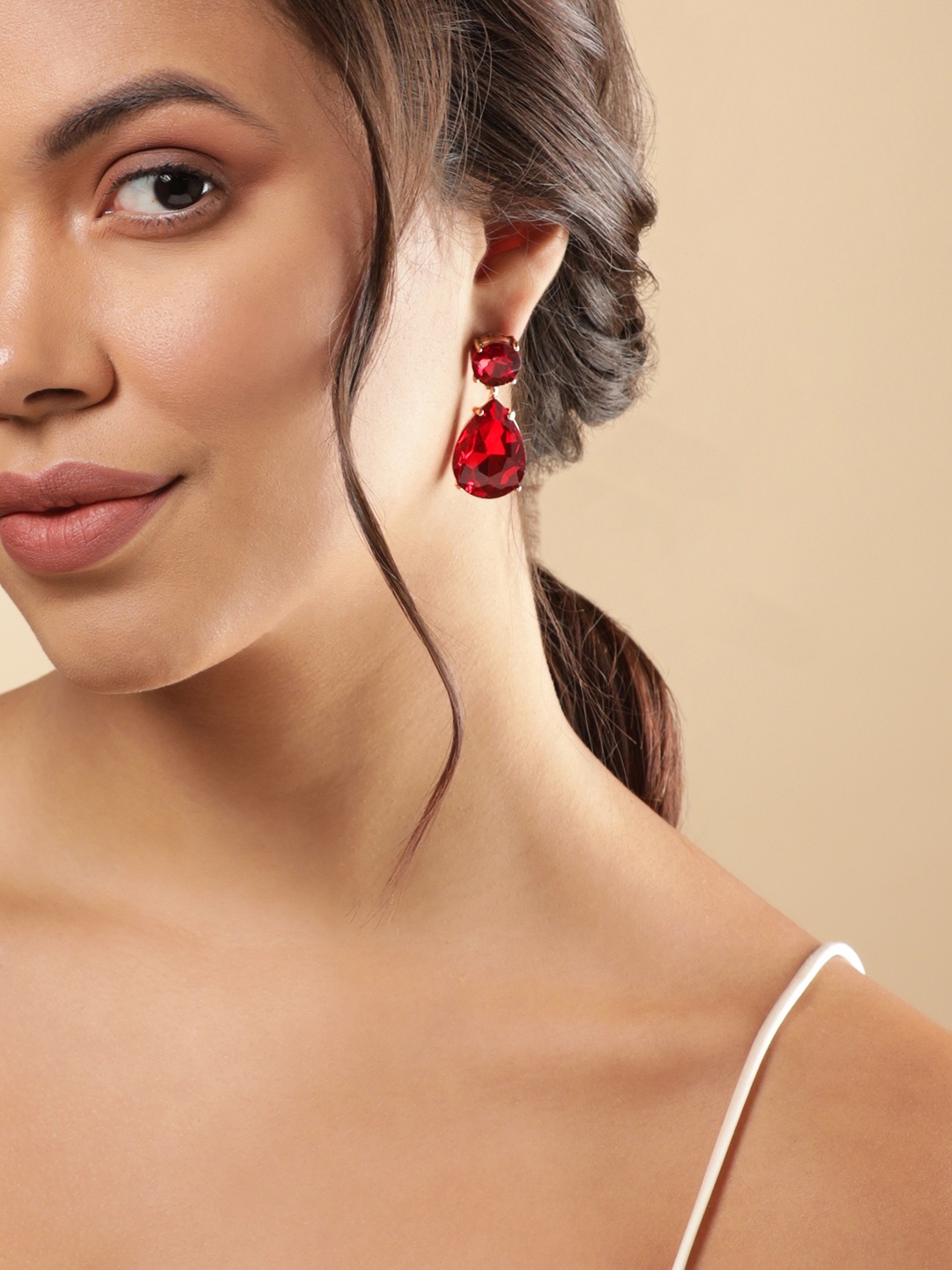 

Rubans Voguish 18KT Gold Plated CZ Studded Teardrop Shaped Drop Earrings