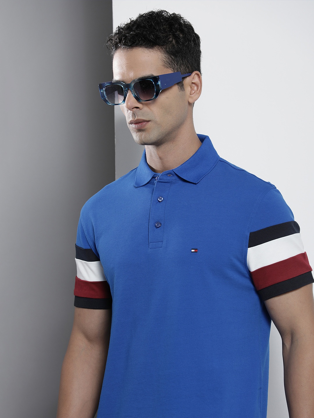 

Tommy Hilfiger Men Placement Striped Polo Collar Pure Cotton Slim Fit T-shirt, Blue