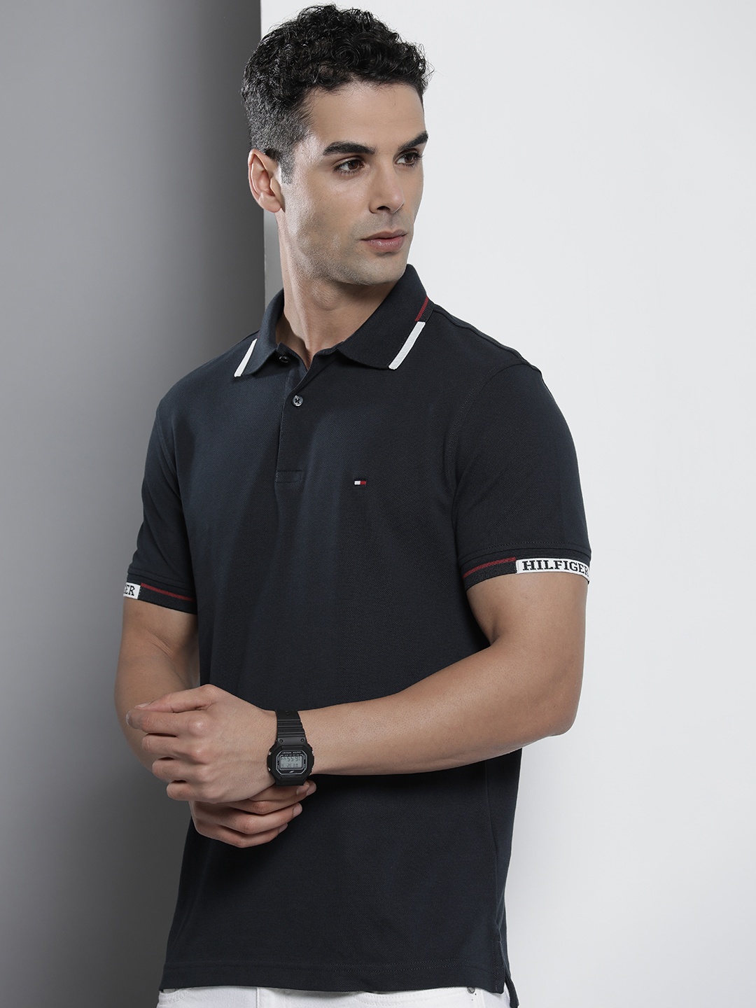 

Tommy Hilfiger Men Solid Polo Collar Indigo Knitted Slim Fit T-shirt, Navy blue