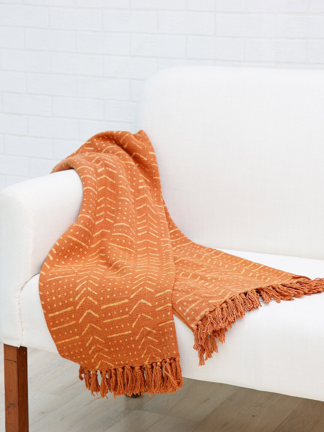 

Ariana Rust Self-Design Cotton Blanket