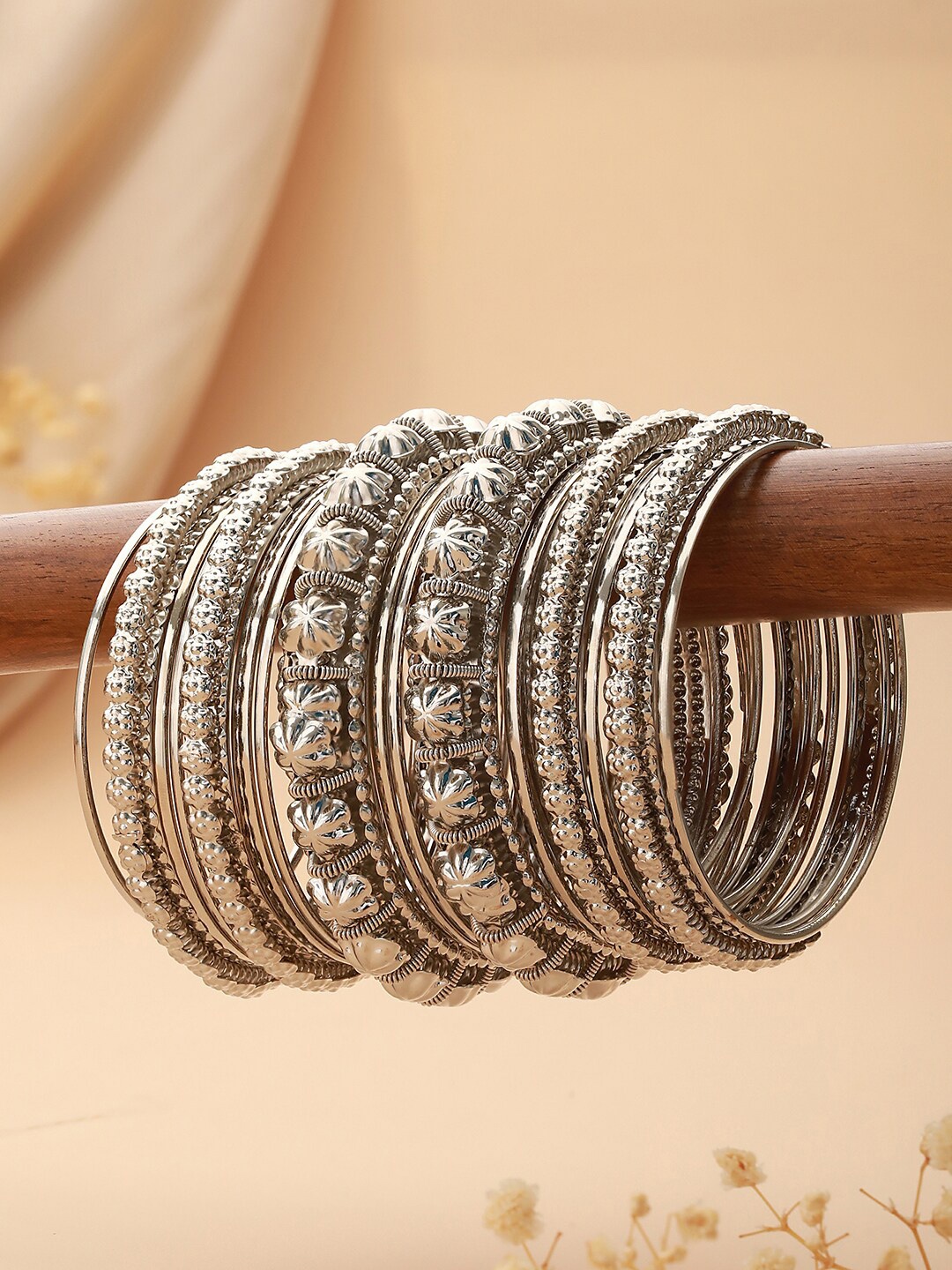 

Jazz and Sizzle Set Of 18 Silver-Plated Textured Oxidised Bangles