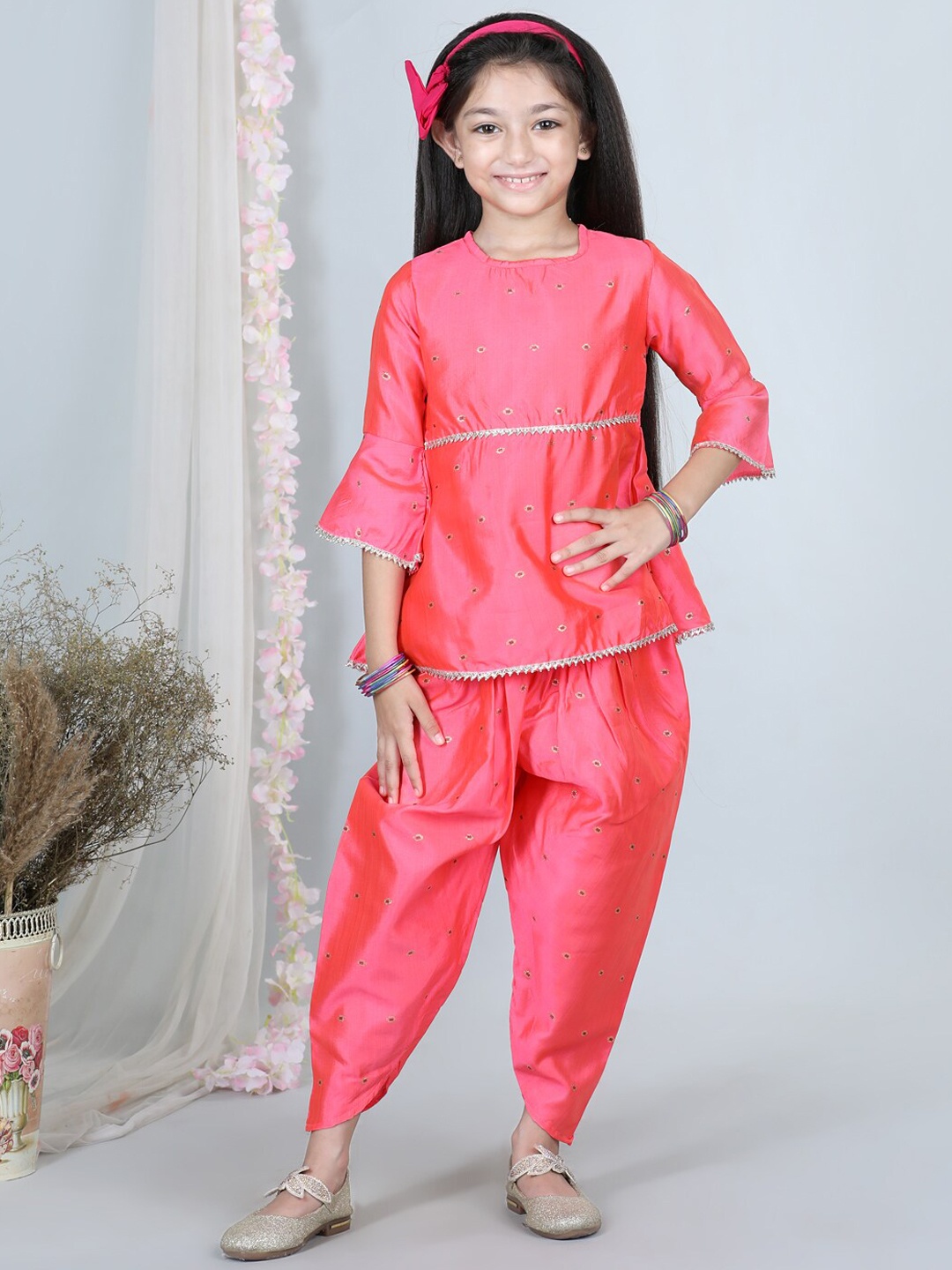 

Cutiekins Girls Round Neck Self Design Gotta Patti Bell Sleeve Kurta with Dhoti Pants, Pink