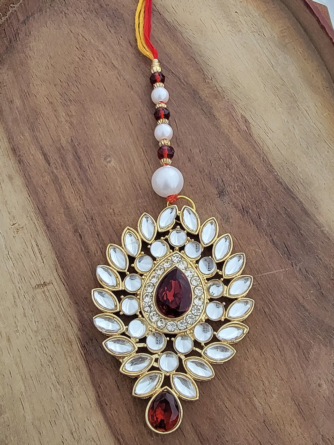 

Mahi Women Stone Studded & Beaded Leaf Shape Lumba Rakhi, Gold