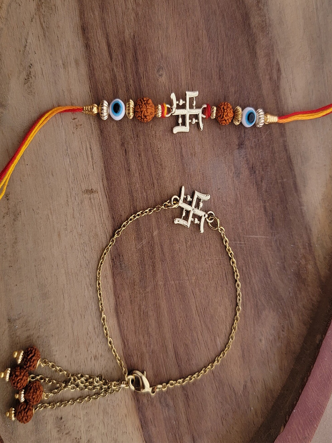 

Mahi Set Of 2 Swastik Charm Rakhis, Blue
