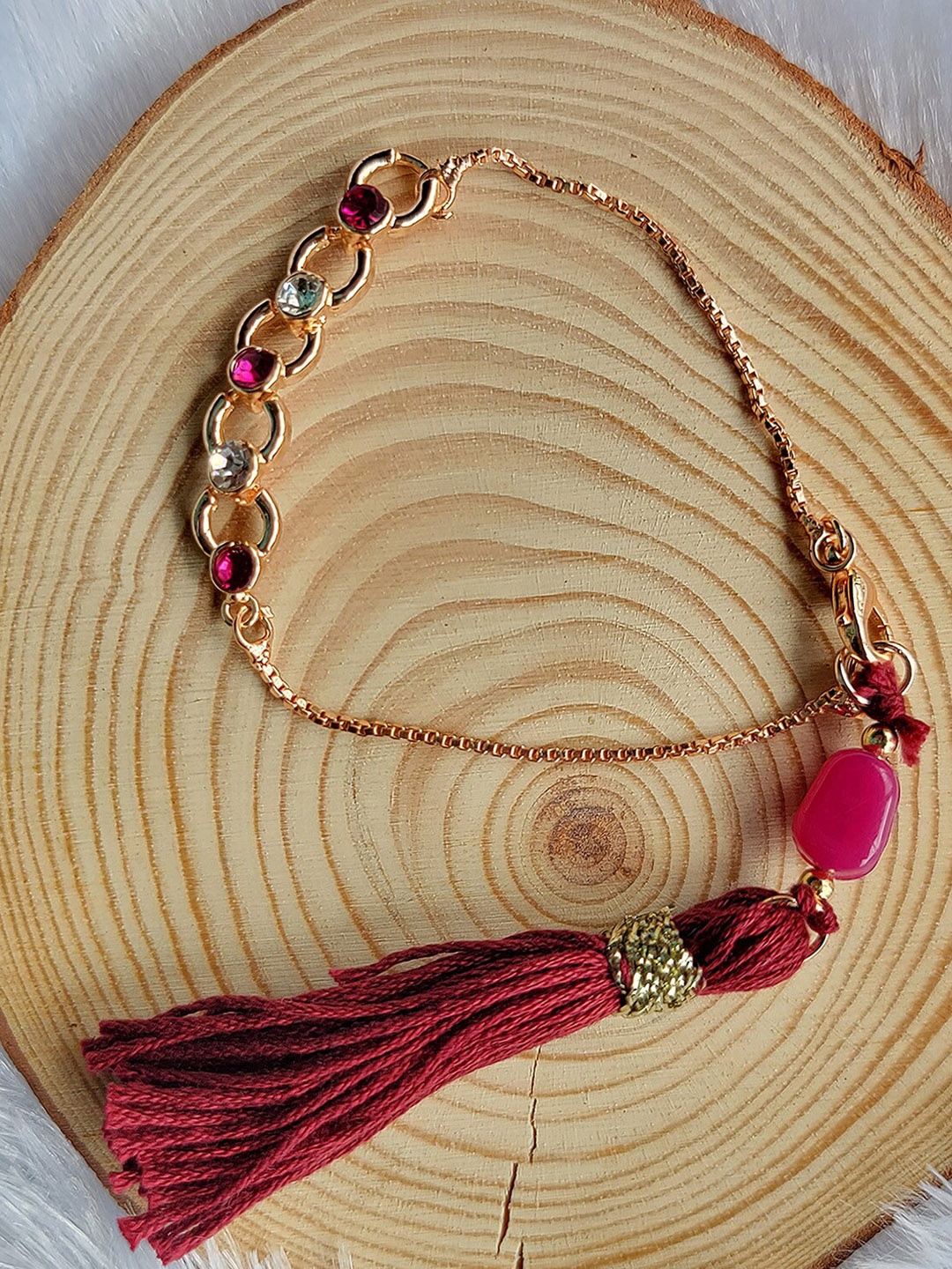 

Mahi Stone-Studded & Beaded Lumba Rakhi, Maroon