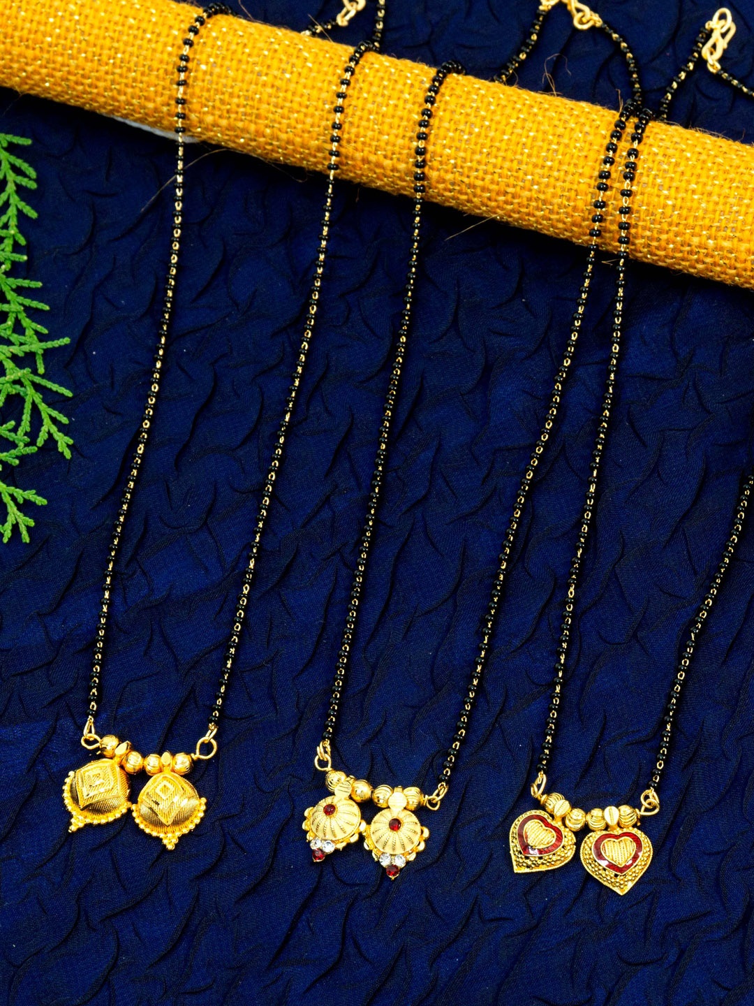 

Ramdev Art Fashion Jwellery Set Of 3 Gold-Plated Stone-Studded & Beaded Mangalsutra