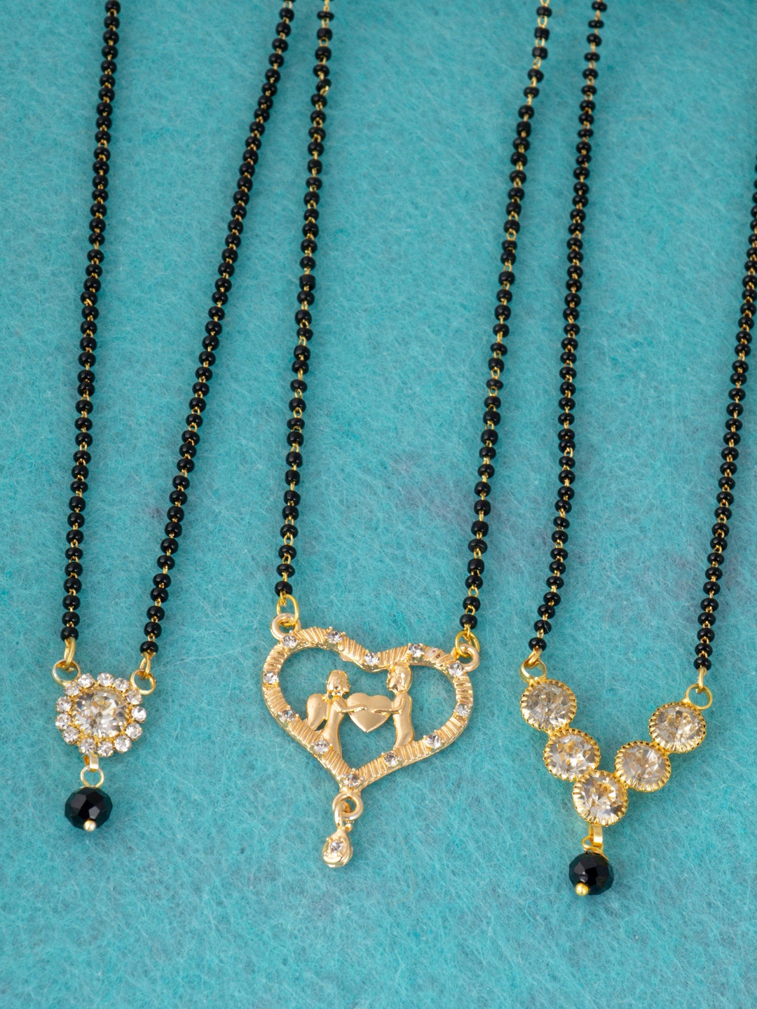 

Ramdev Art Fashion Jwellery Set Of 3 Gold-Plated Stone-Studded & Beaded Mangalsutras