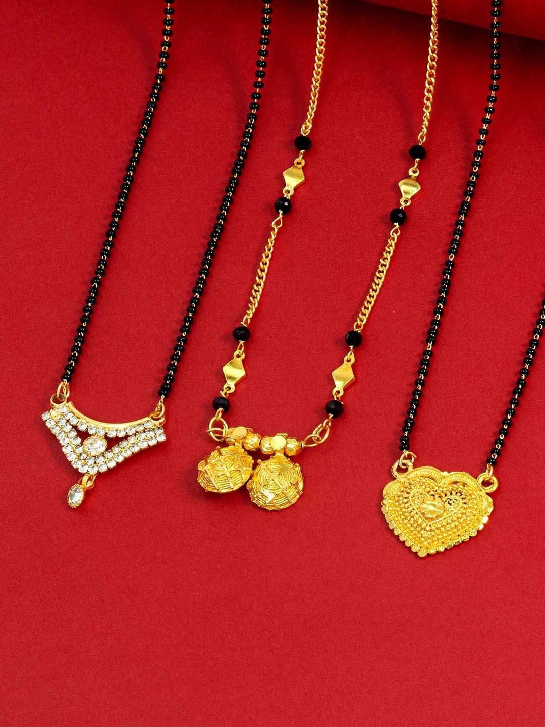 

Ramdev Art Fashion Jwellery Set of 3 Gold-Plated Stone-Studded & BeadedMangalsutras