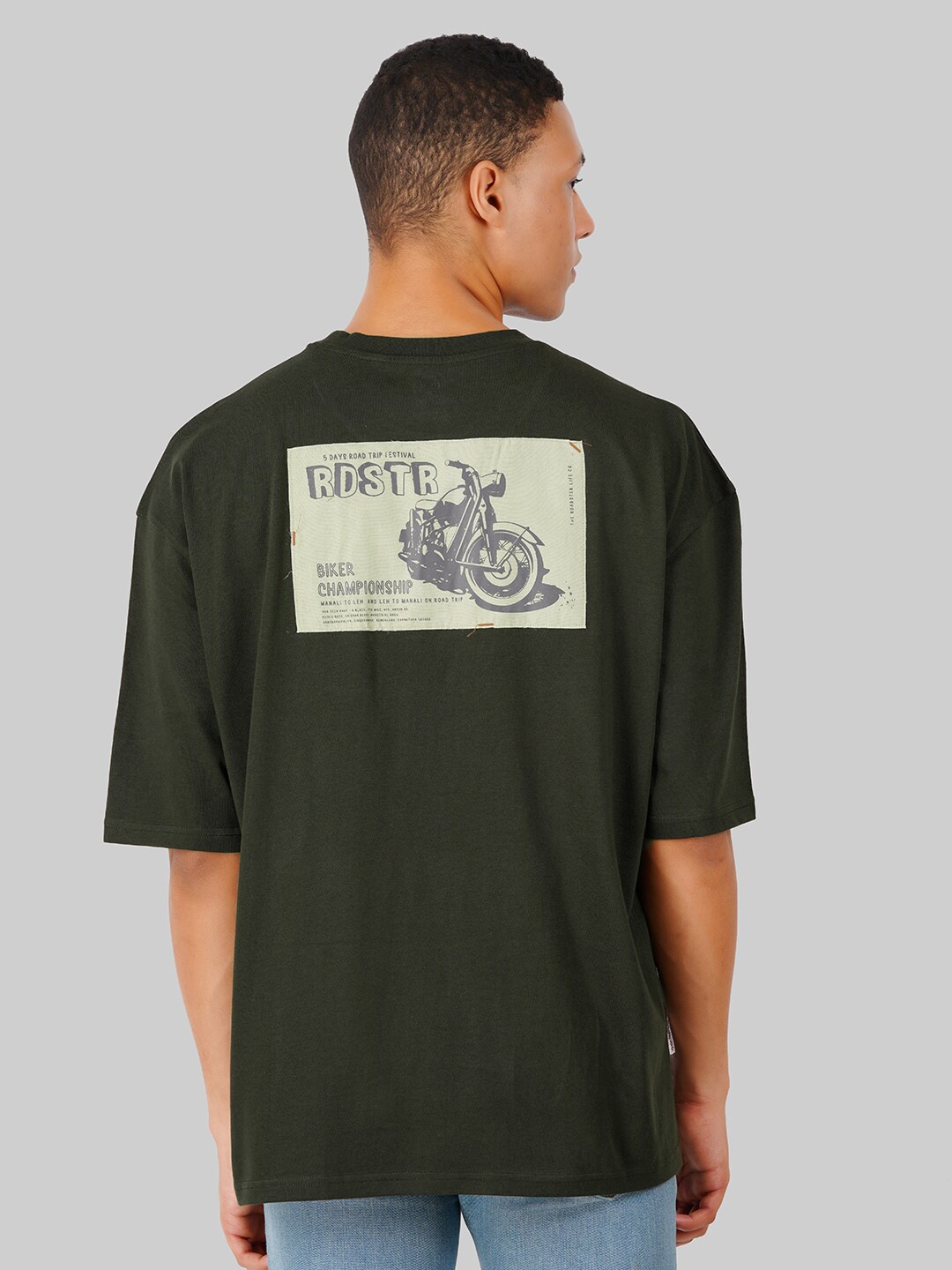 

Roadster Olive Graphic Printed Drop Shoulder Sleeves Oversized Fit Pure Cotton T-Shirt