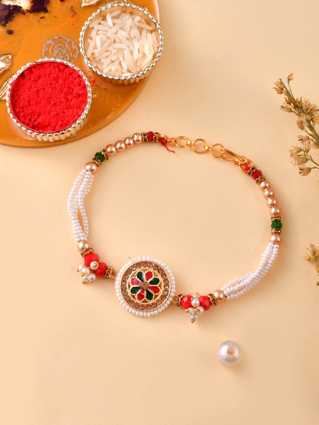 

Aapno Rajasthan Kundan-Studded & Beaded Rakhi With Roli Rice & Greeting card, Gold
