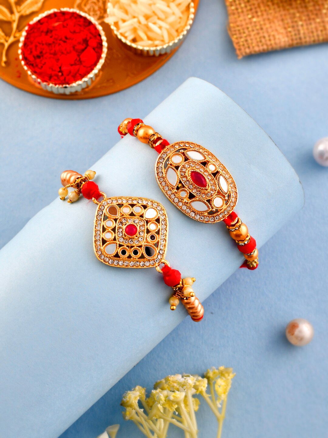 

Aapno Rajasthan Unisex Set Of 2 Stone-Studded & Beaded Rakhis, Gold
