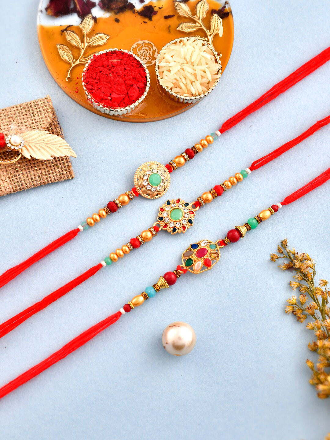 

Aapno Rajasthan Set of 3 Kundan Enamled Beaded Rakhi, Gold