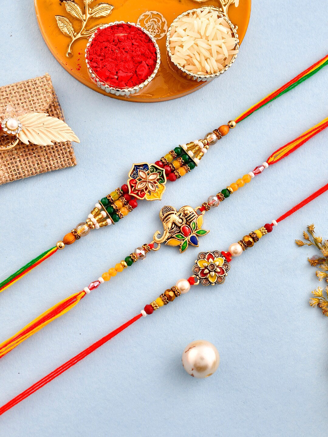 

Aapno Rajasthan Set Of 3 Red & Yellow Kundan Stone Studded Rakhi