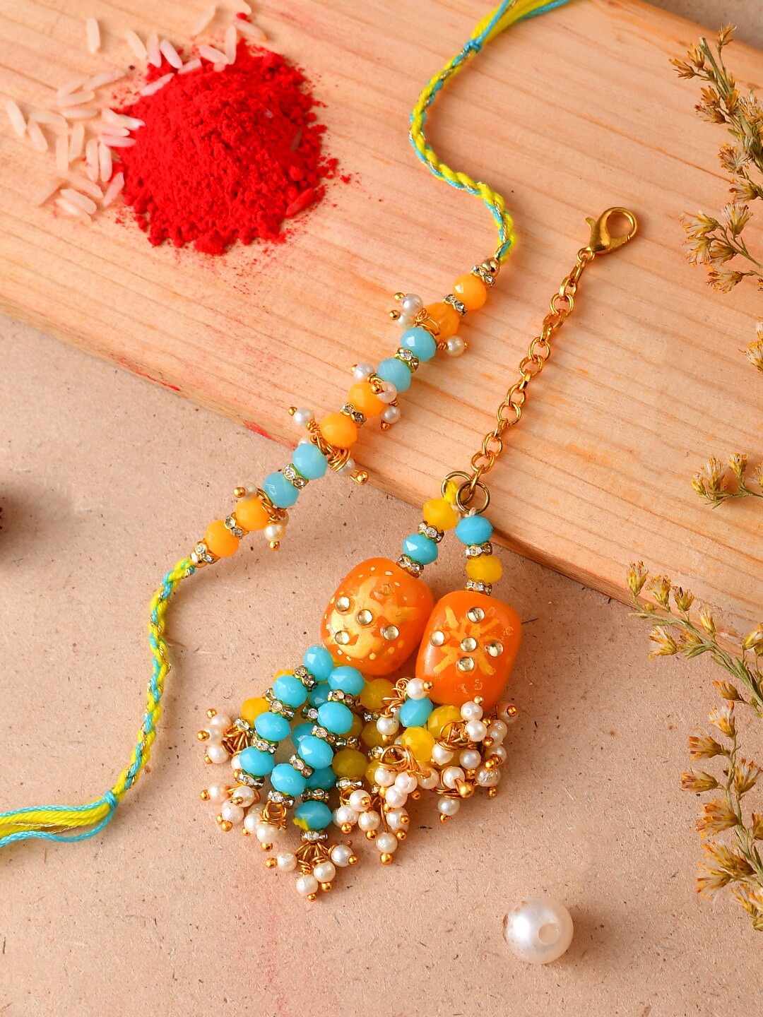 

Aapno Rajasthan Unisex Set Of 2 Beaded Rakhis, Yellow
