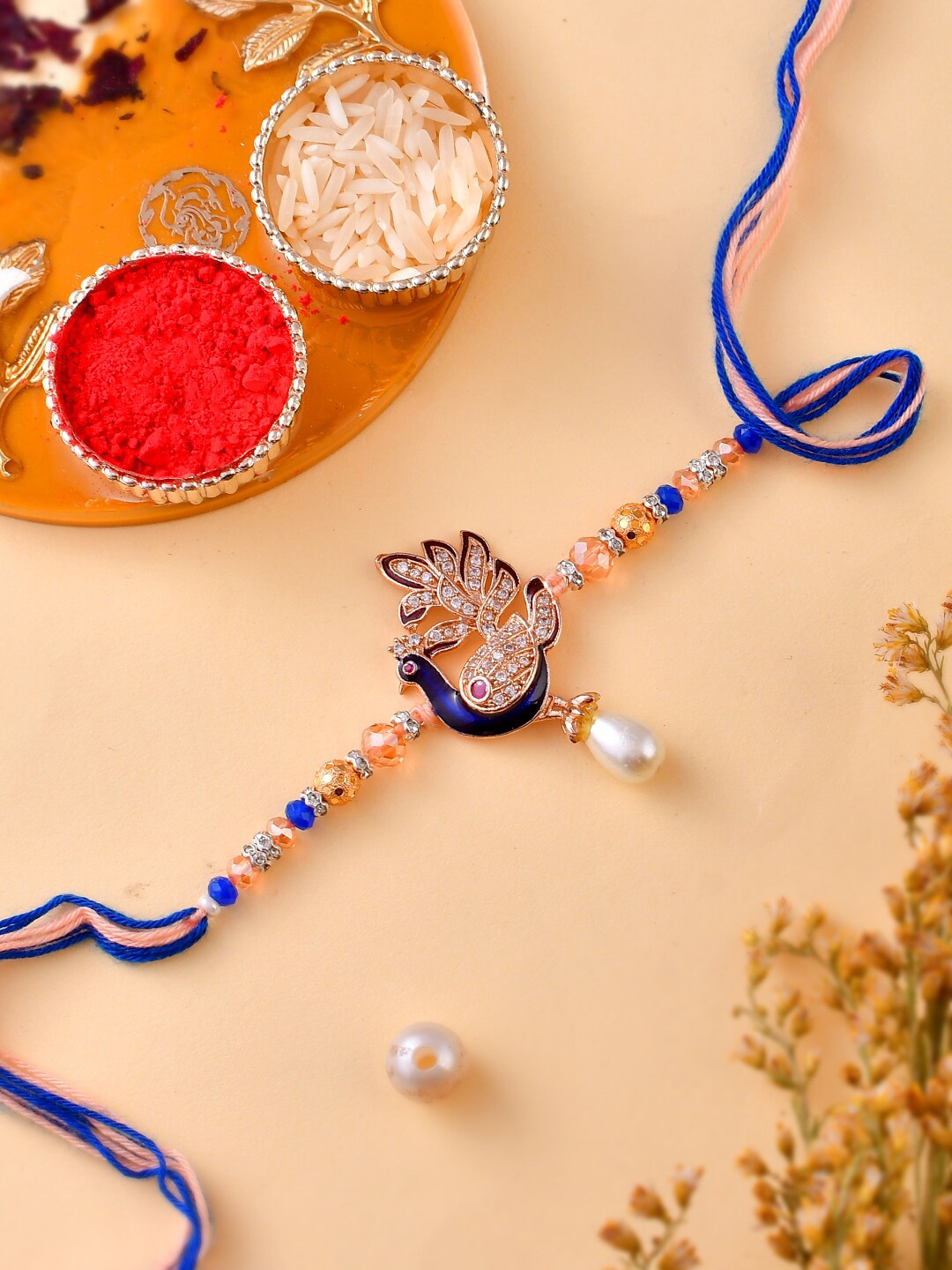 

Aapno Rajasthan Beads & Stones Handcrafted Royal Peacock Rakhi, Blue
