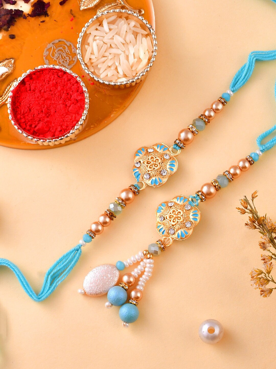

Aapno Rajasthan Unisex Set Of 2 Beaded Elegant Bhaiya Bhabhi Rakhi, Blue