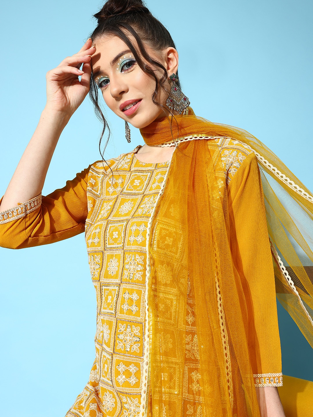 

Indo Era Women Floral Embroidered Regular Thread Work Kurta with Sharara & Dupatta, Mustard