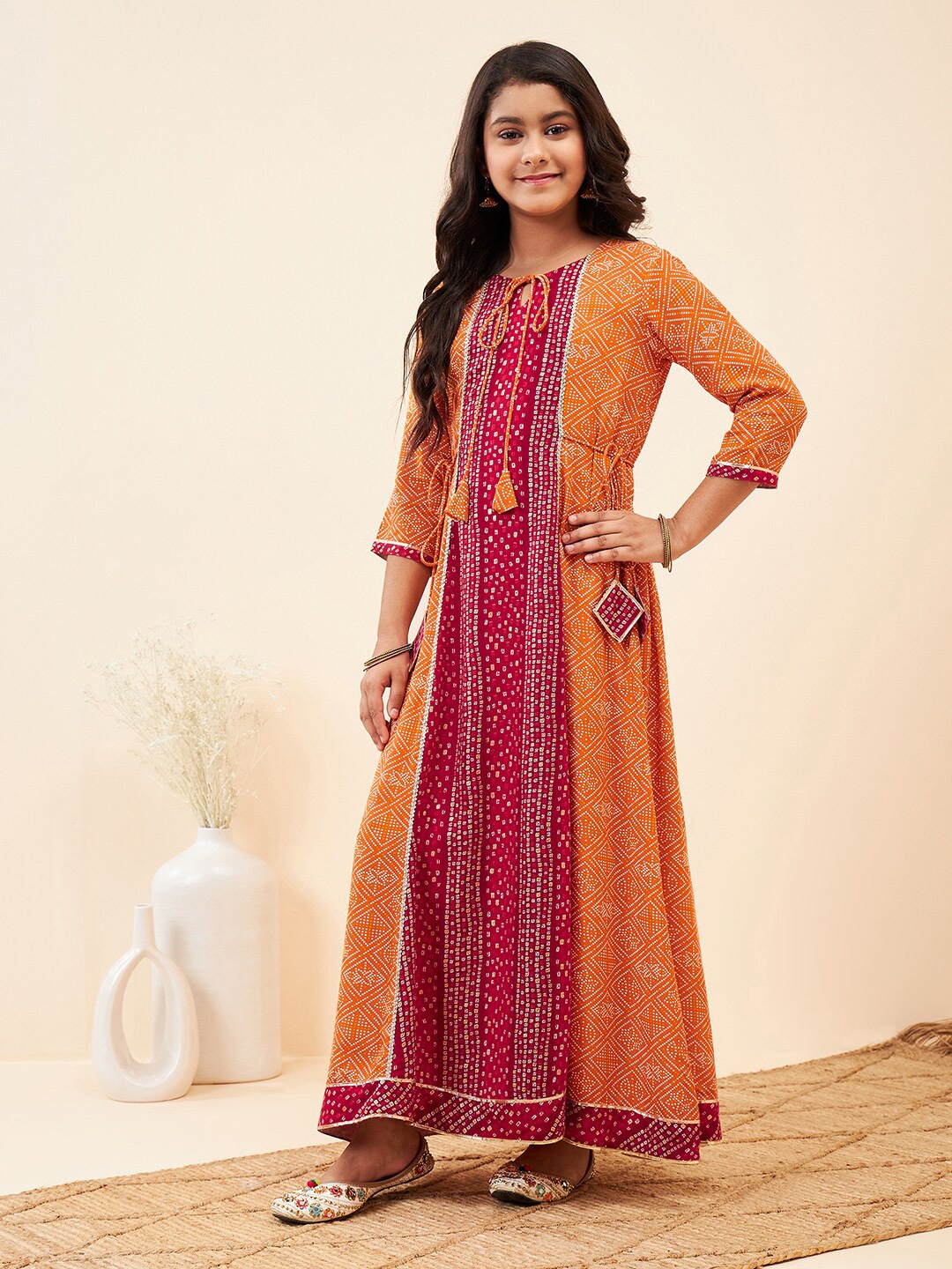

Stylo Bug Ethnic Motifs Printed Tie-Up Neck Tie-Ups Detail Maxi Dress, Orange