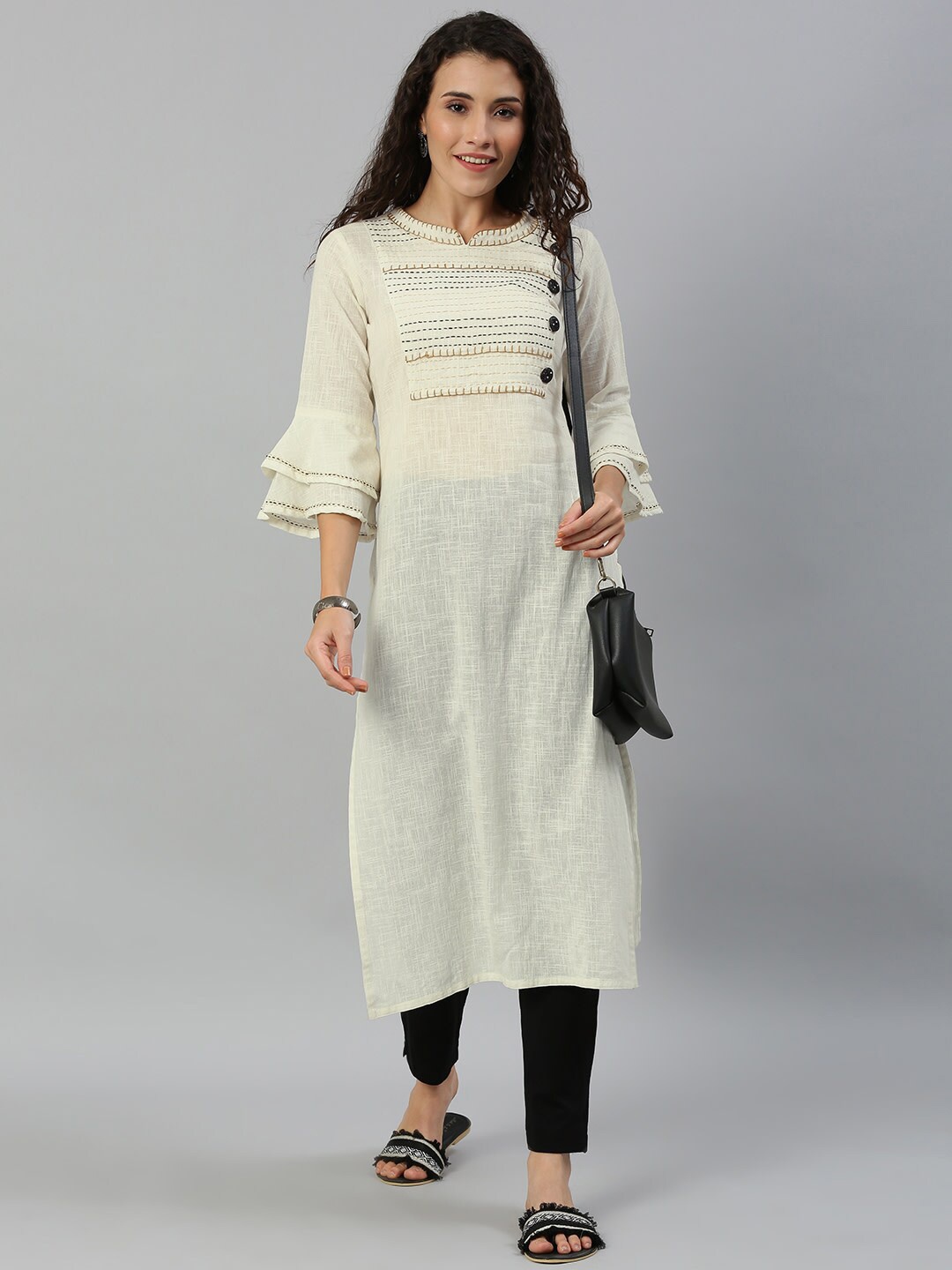 

KALINI Geometric Yoke Design Flared Sleeves Thread Work Straight Kurta, White
