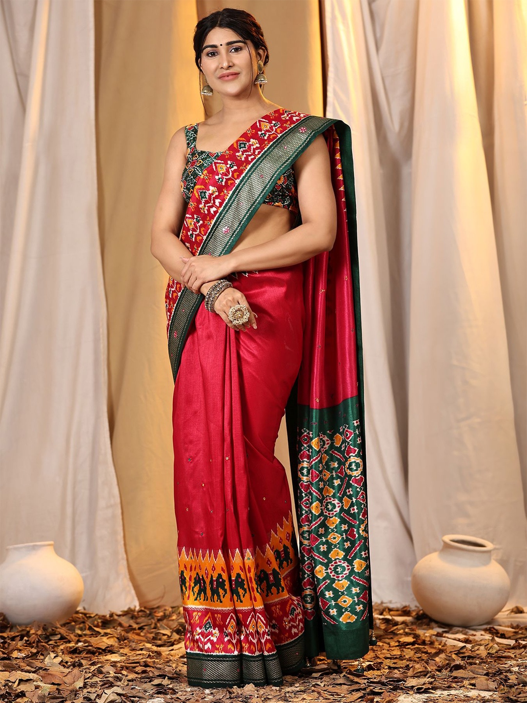 

Phenav Embellished Zari Pure Silk Patola Saree, Red
