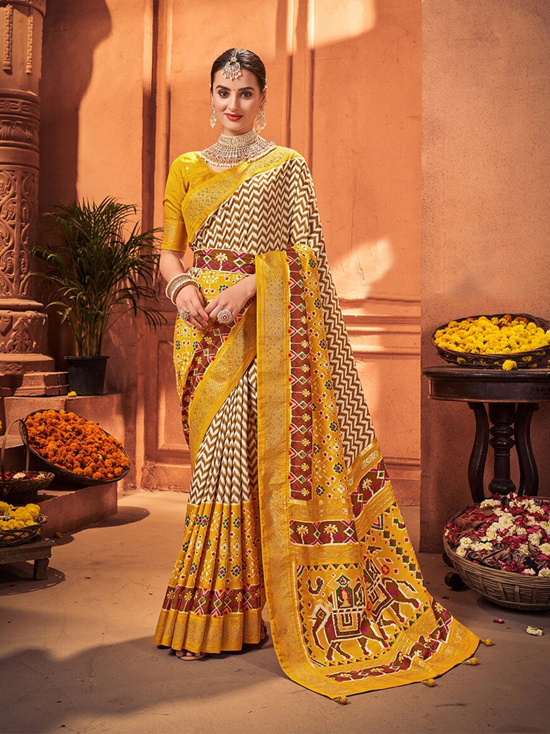 

Mitera Off White & Yellow Geometric Printed Silk Cotton Patola Saree