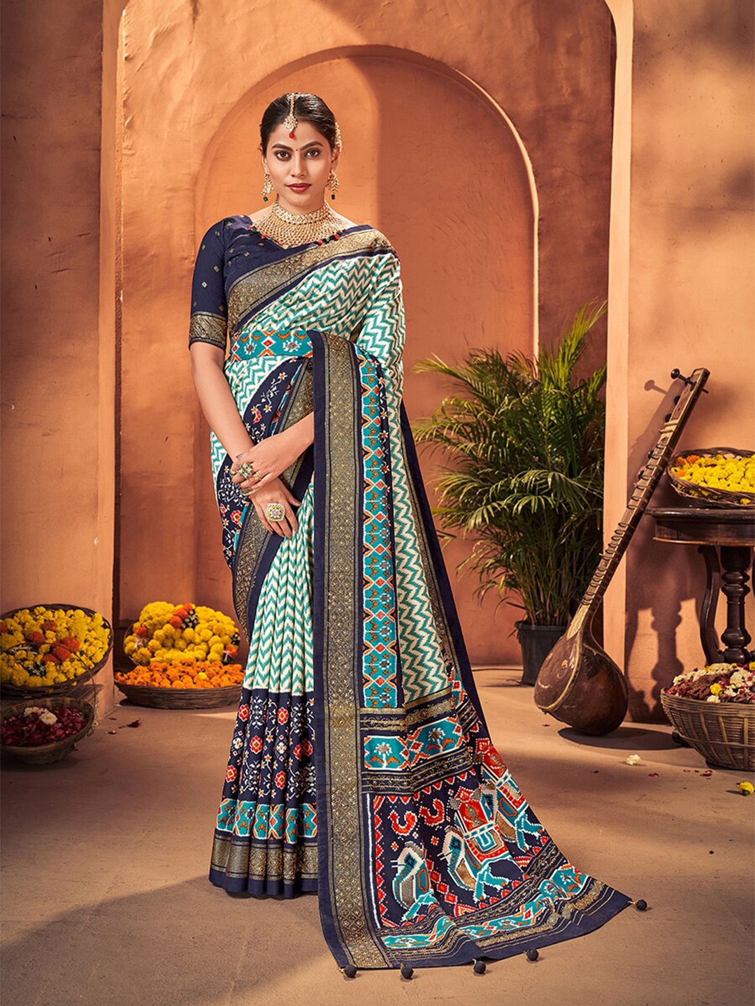

Mitera Off White & White Geometric Printed Zari Silk Cotton Patola Saree