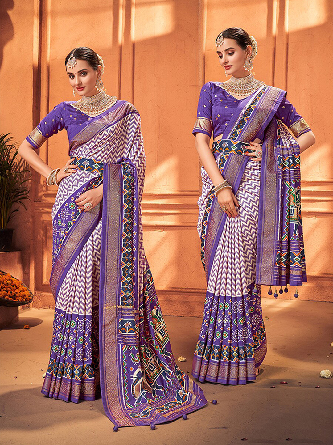 

Mitera Purple & White Geometric Printed Zari Silk Cotton Belted Patola Saree