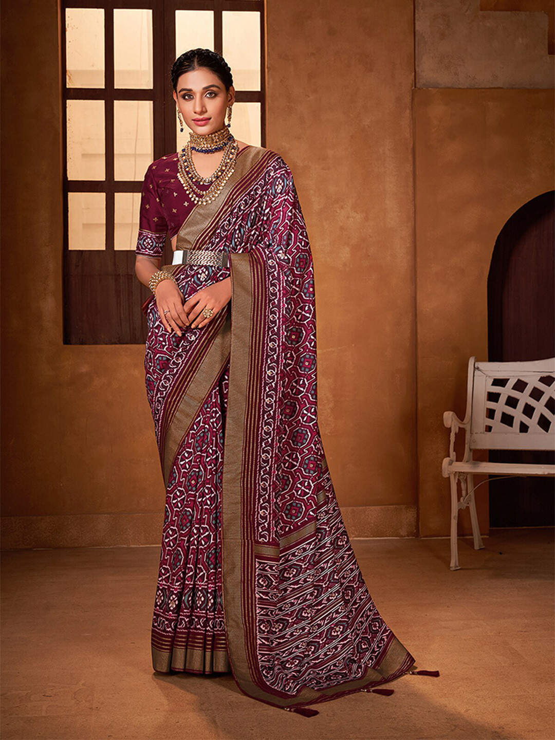 

Mitera Purple & Gold-Toned Ajrak Printed Zari Silk Cotton Patola Saree