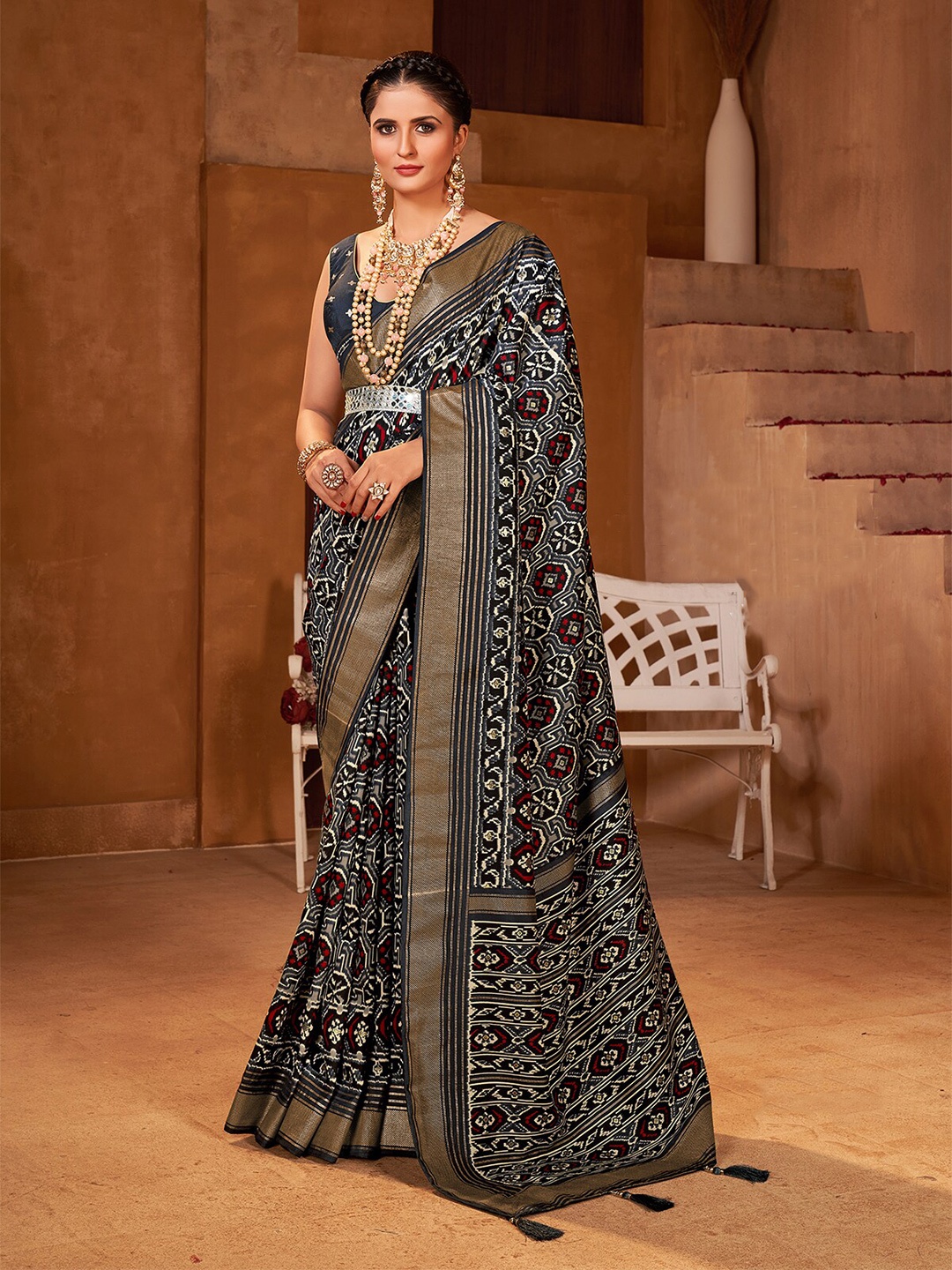 

Mitera Black & Gold-Toned Ethnic Motifs Printed Zari Silk Cotton Patola Saree