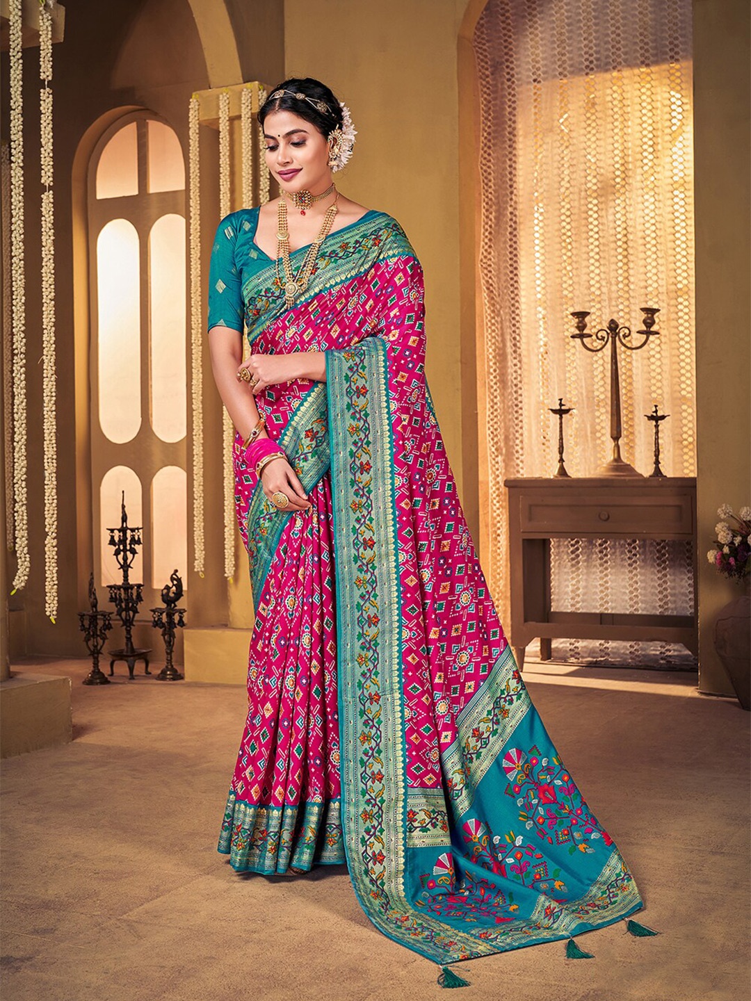 

Mitera Pink & Blue Ethnic Motifs Printed Zari Silk Cotton Mysore Silk Saree