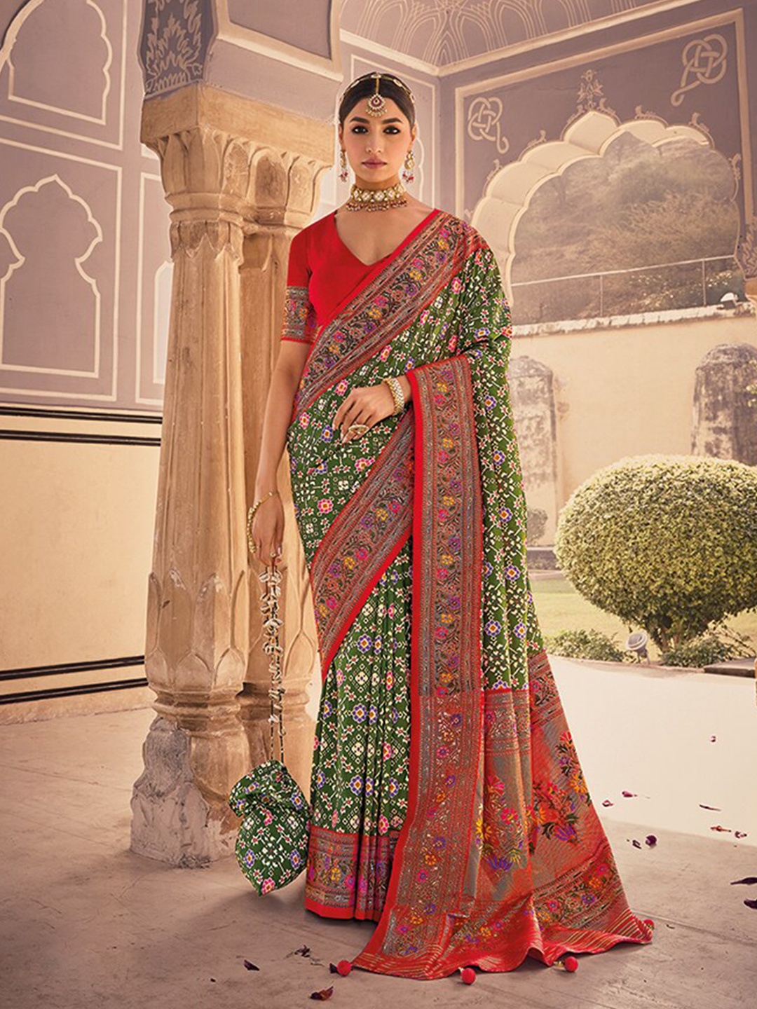 

Mitera Green Bandhani Printed Zari Silk Cotton Patola Saree