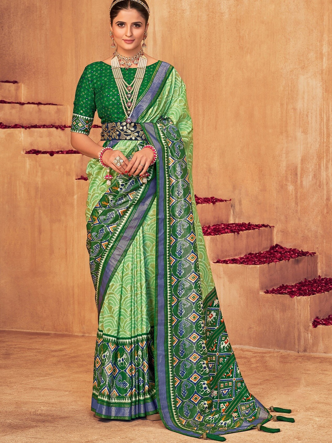 

Mitera Green Bandhani Printed Zari Silk Cotton Patola Saree