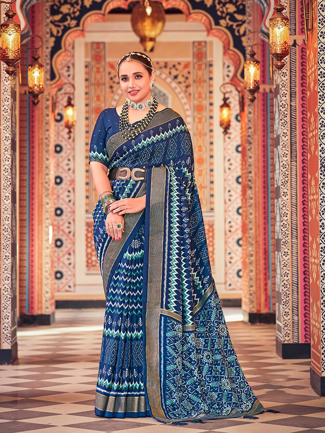 

Mitera Cream Ethnic Motifs Printed Zari Silk Cotton Ikat Saree, Blue