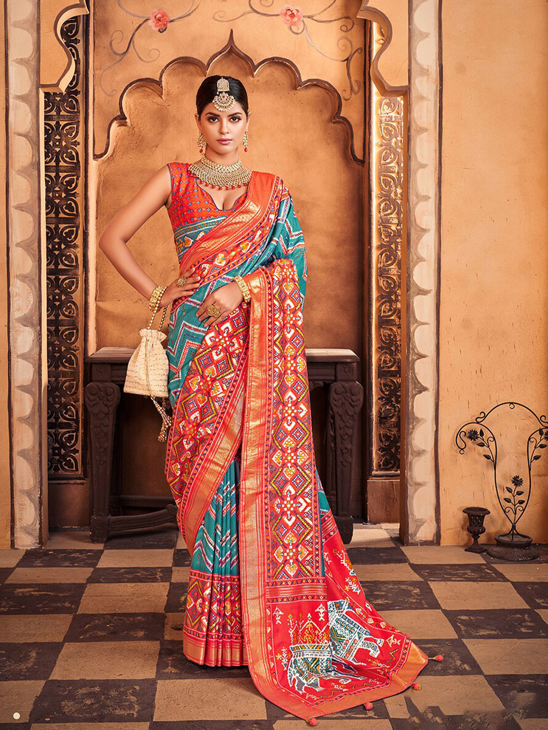 

Mitera Blue Ethnic Motifs Printed Zari Silk Cotton Mysore Silk Saree
