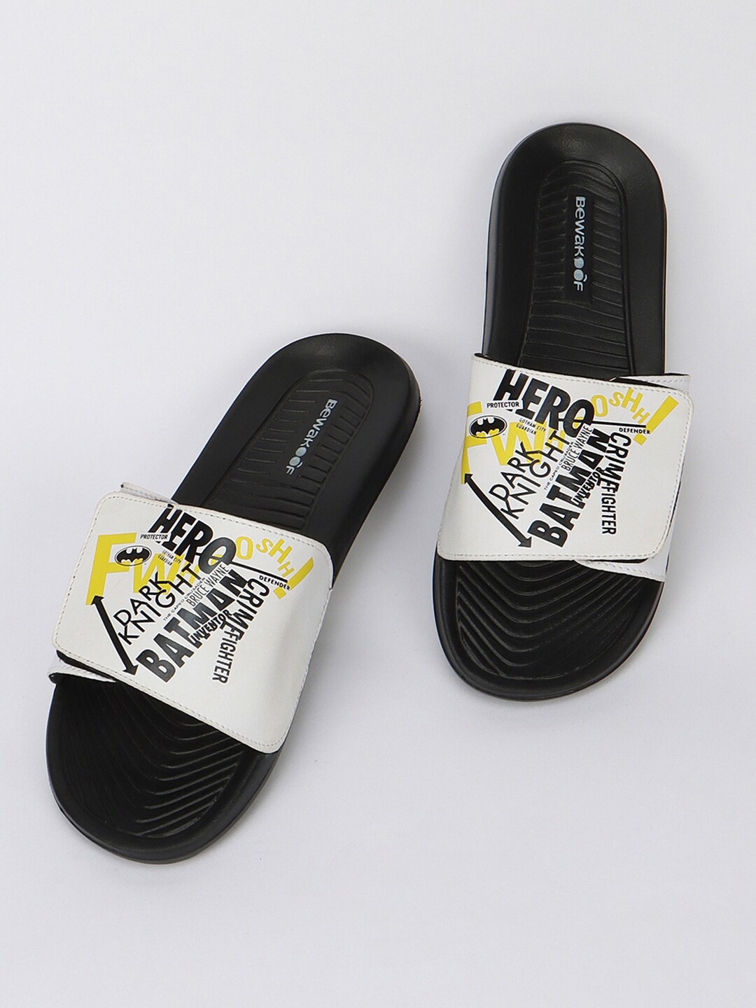 

Bewakoof Men Black & White X Official Dc Comics Batman Printed Rubber Sliders