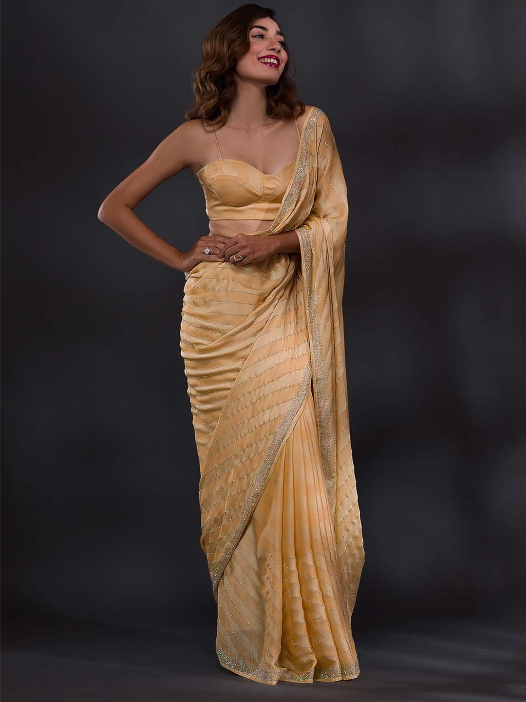 

Koskii Embellished Beads and Stones Poly Crepe Saree, Yellow