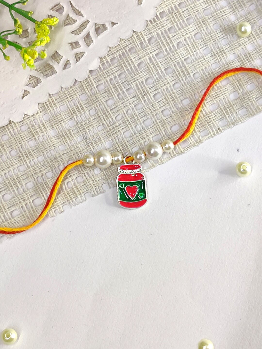 

The Magic Wand Kids Beaded Jar Charm Rakhi, Red