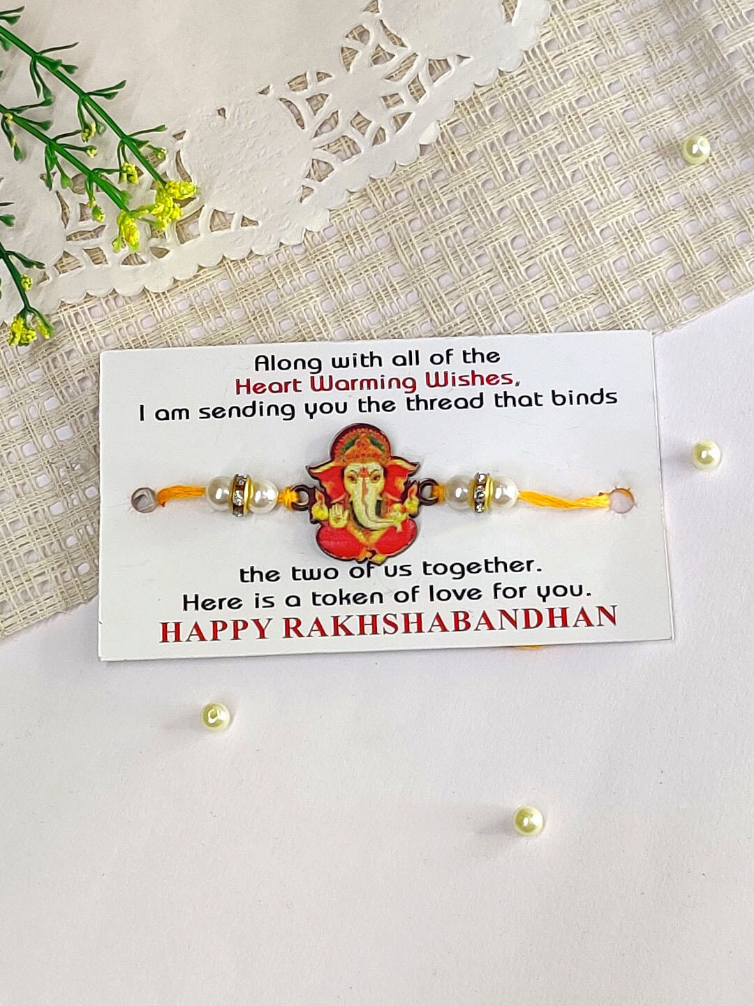 

The Magic Wand Kids Ganesh Charm & Beaded Thread Rakhi, Orange
