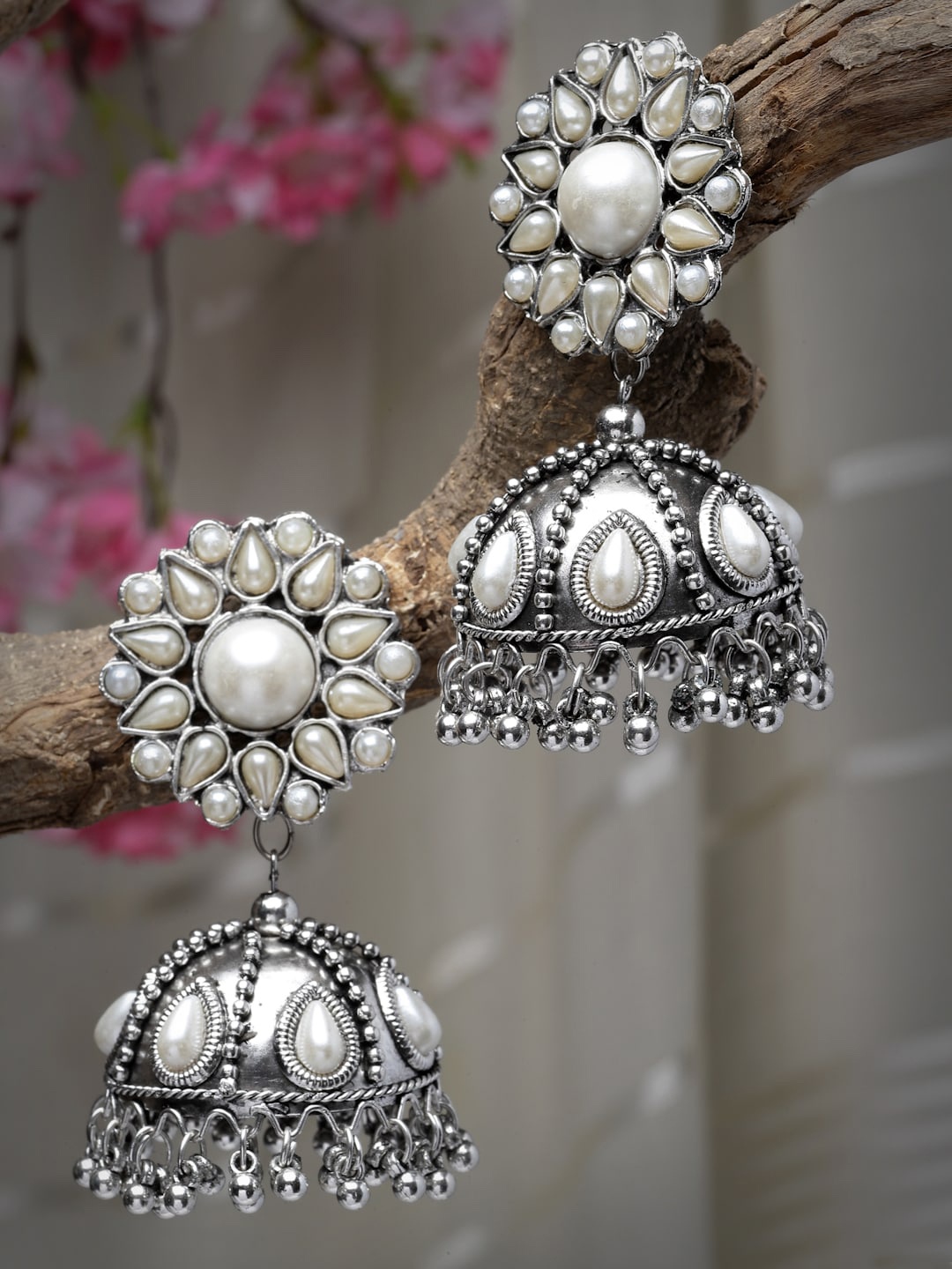 

Moedbuille Silver-Plated Pearl-Studded Dome Shaped Oxidised Jhumkas