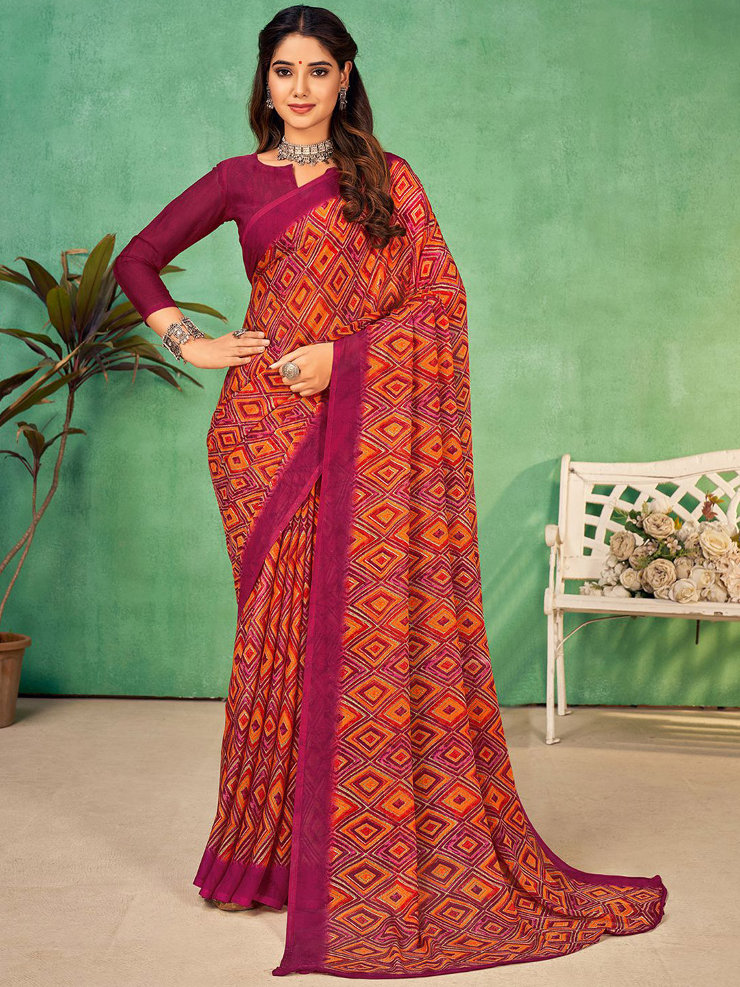 

Mitera Pink Geometric Printed Poly Chiffon Saree
