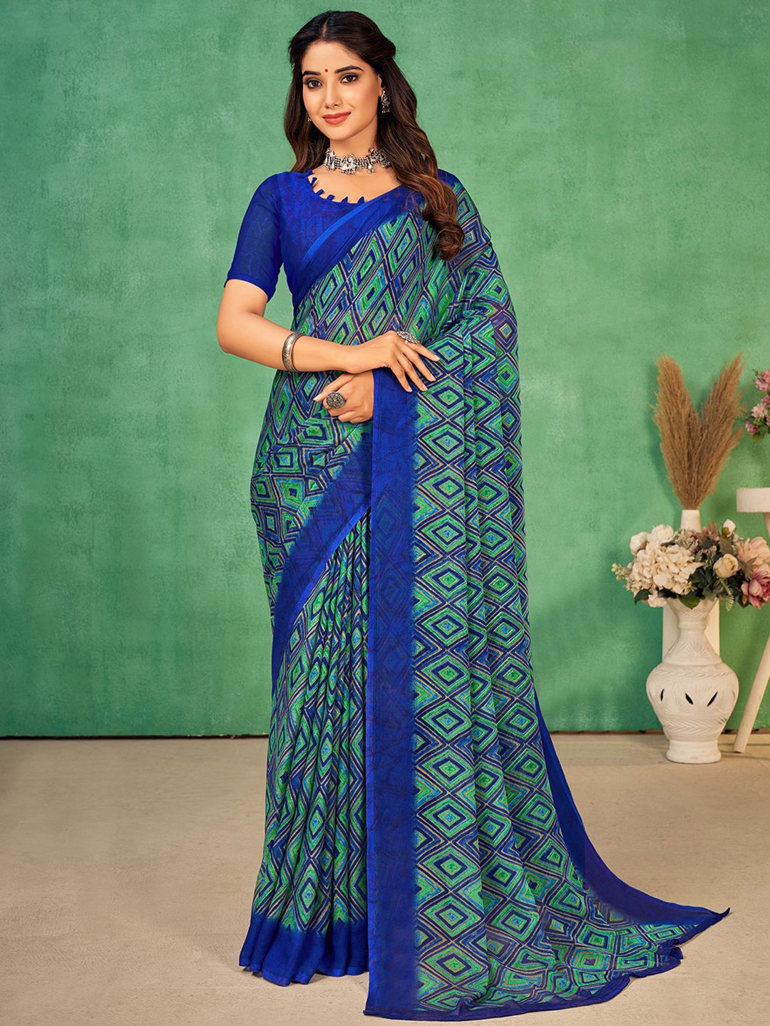 

Mitera Blue & Green Geometric printed Poly Chiffon Saree