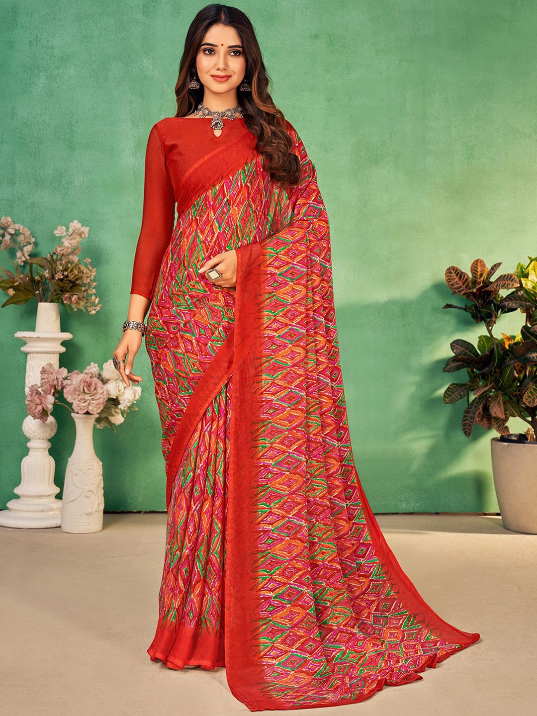 

Mitera Orange-Coloured & Green Ethnic Motifs Printed Poly Chiffon Saree