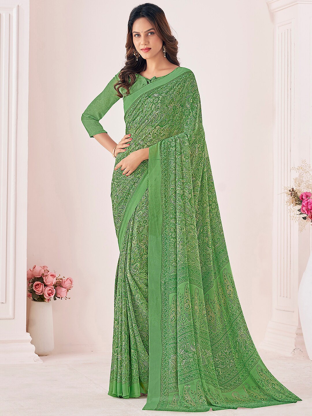 

Mitera Green & White Ethnic Motifs Poly Georgette Saree