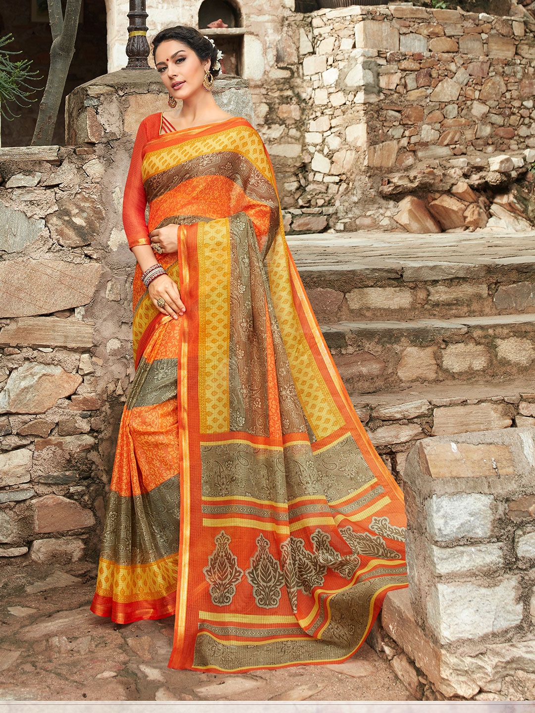 

Shaily Orange & Green Ethnic Motifs Printed Zari Silk Cotton Saree